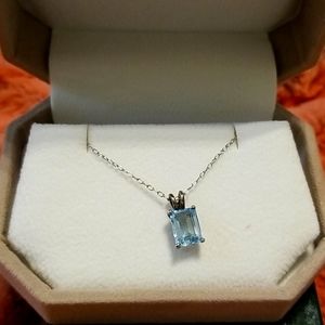Aquamarine pendant on silver chain